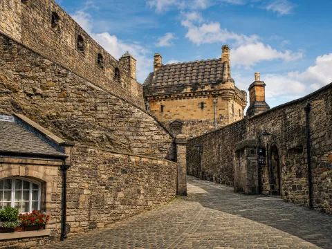 Sunlit stone courtyard of the castle